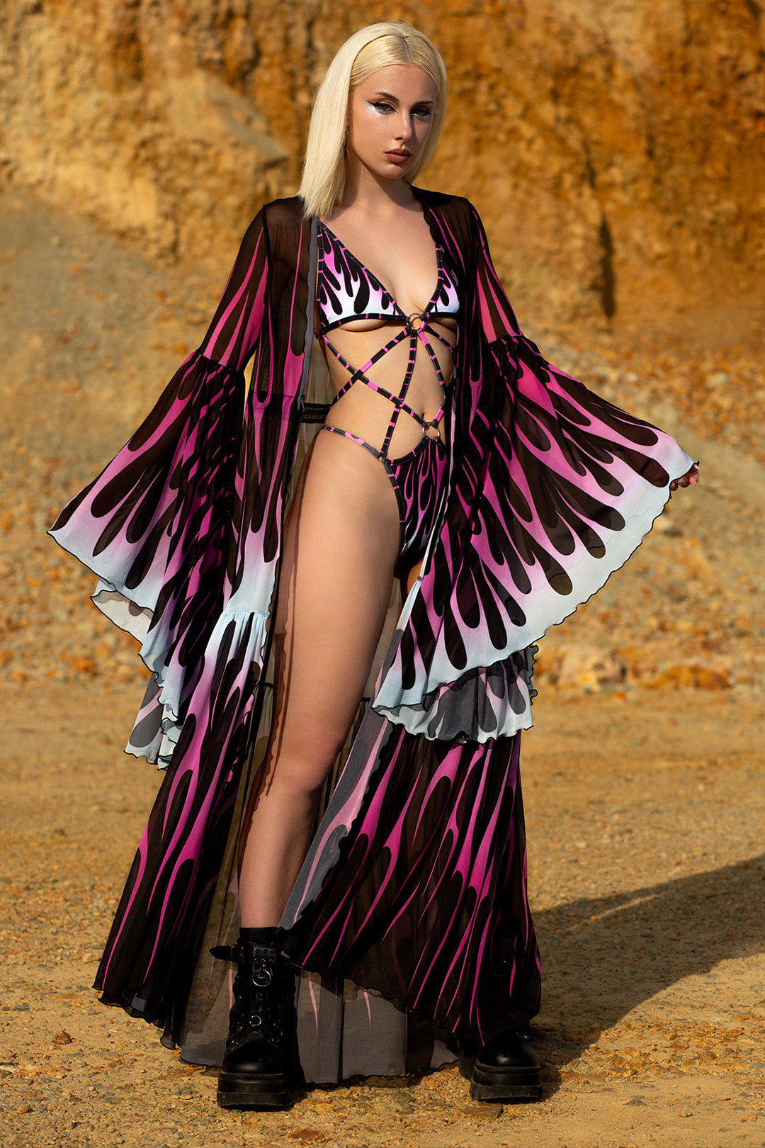 spandex form-fitting bodysuit with a sheer mesh duster