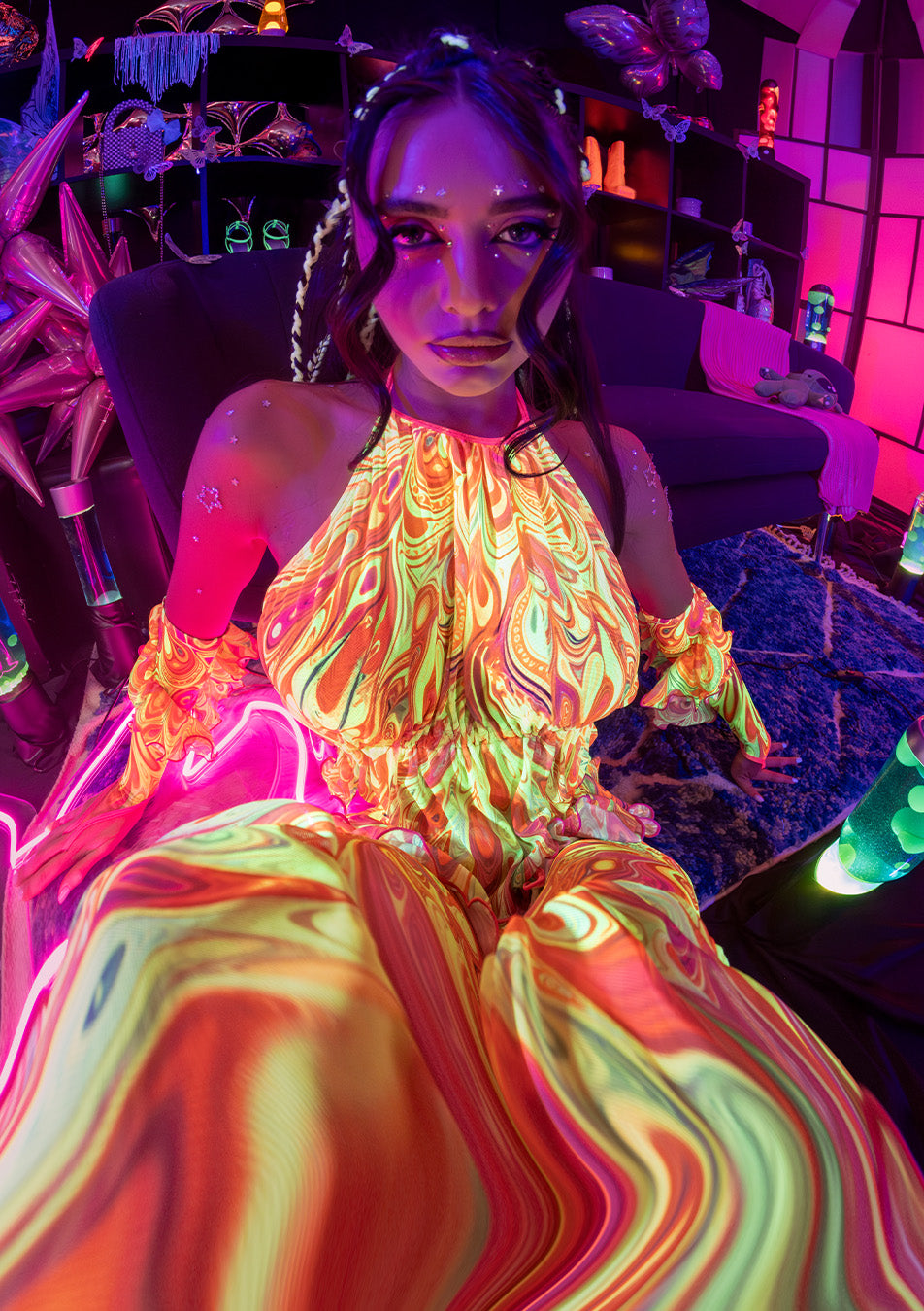 women attending Beyond Wonderland in a neon yellow uv-reactive fashion set
