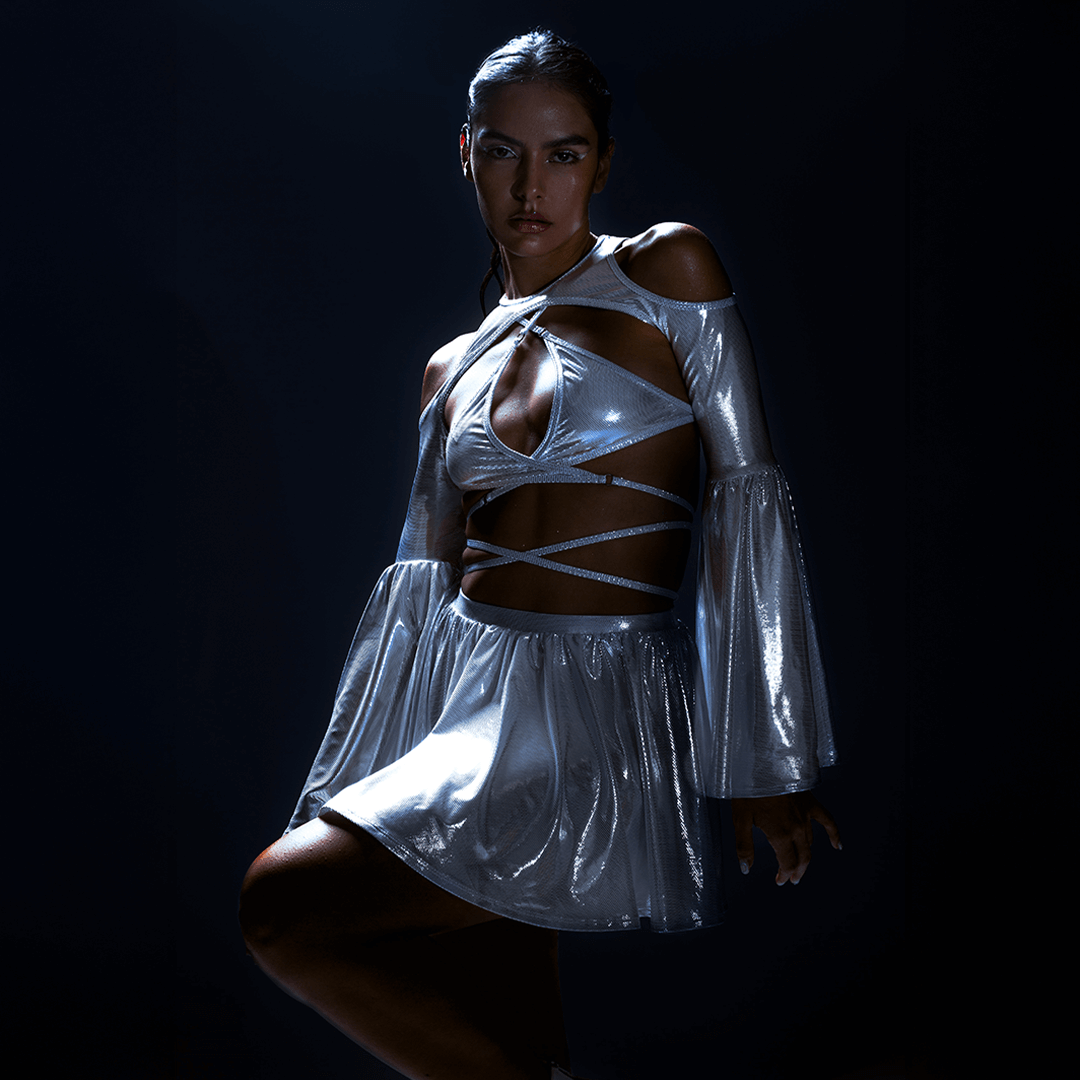 girl wearing silver festival outfit for Coachella music festival