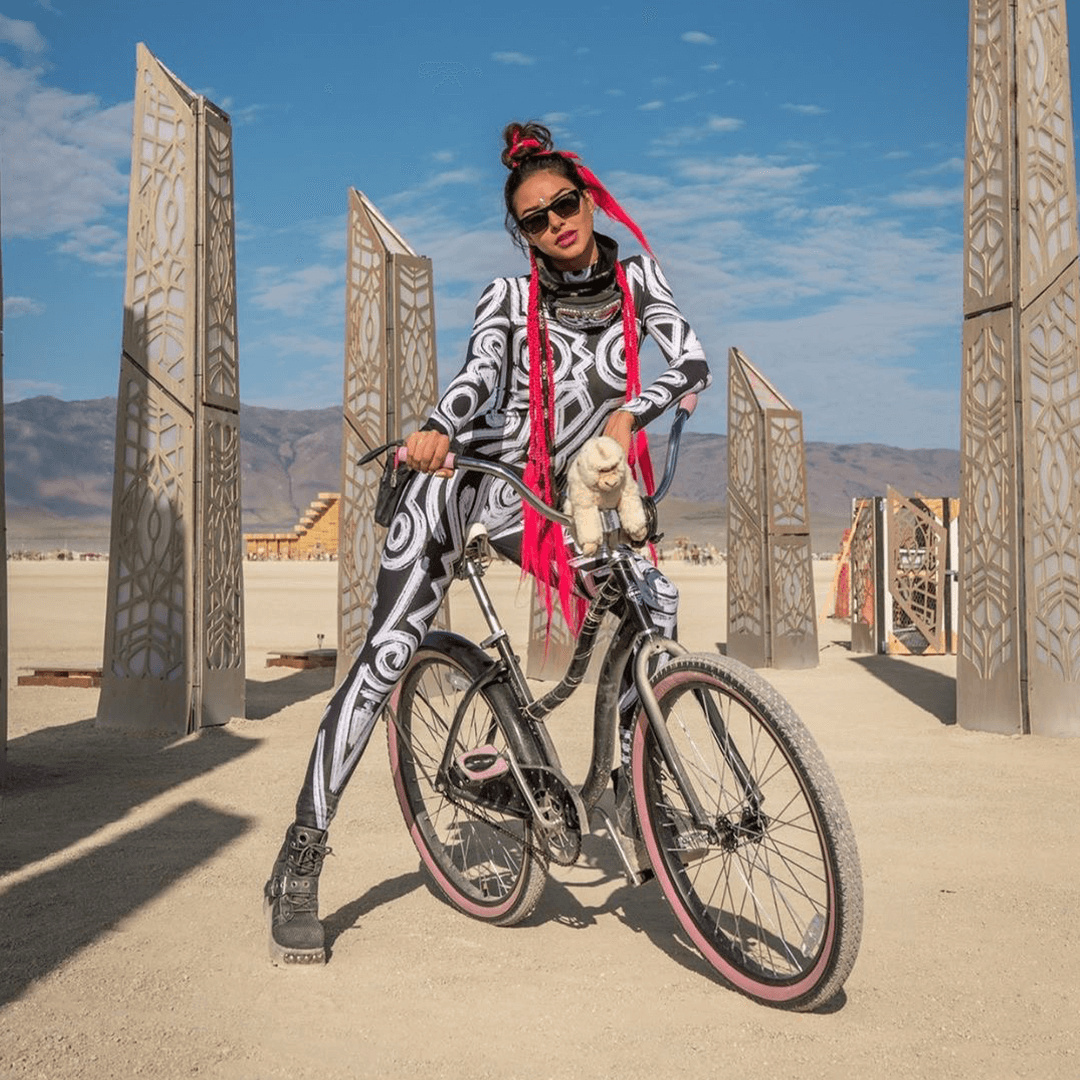Woman on bicycle at Burning Man