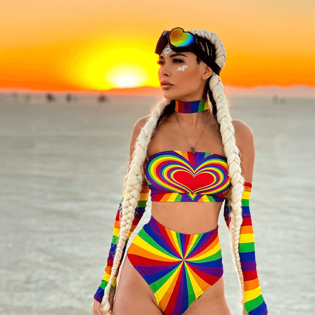 A woman with rainbow matching two-piece set at Burning Man