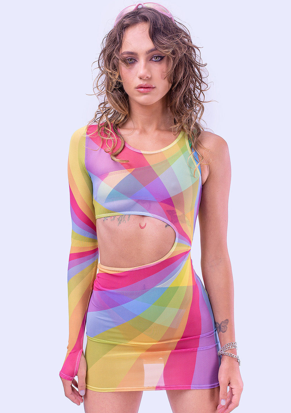 woman wearing an asymmetric cut-out Pride dress