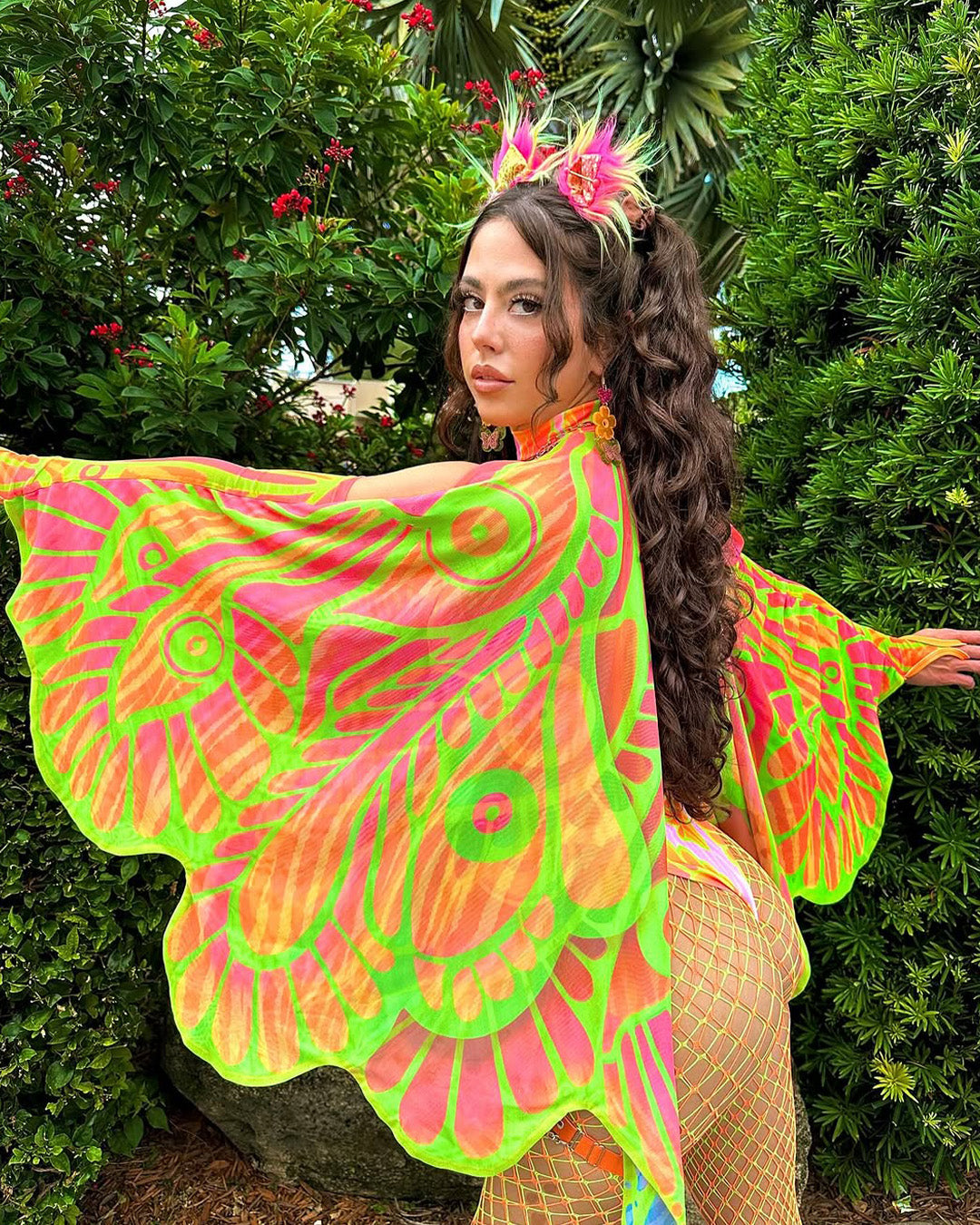 woman in a creative winged outfit for a festival