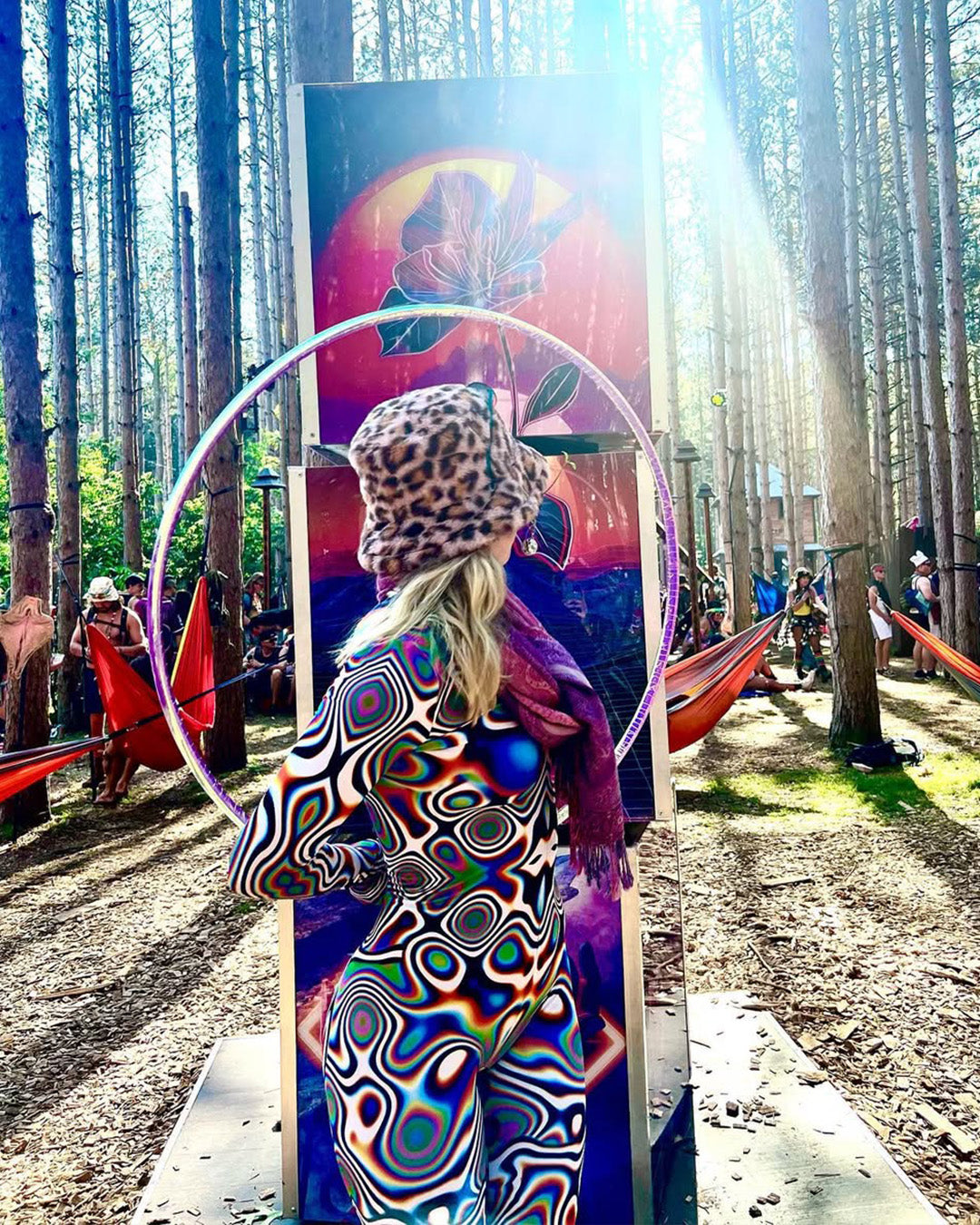 woman in an all-over printed full-body costume on a journey through the Electric Forest