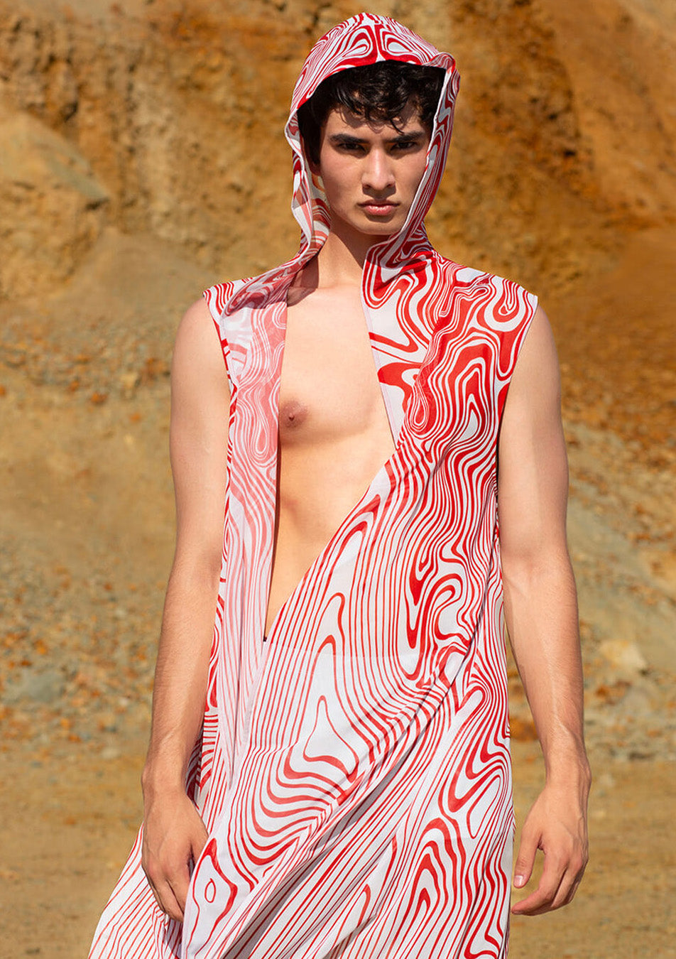 man in a hooded mesh duster for Tomorrowland
