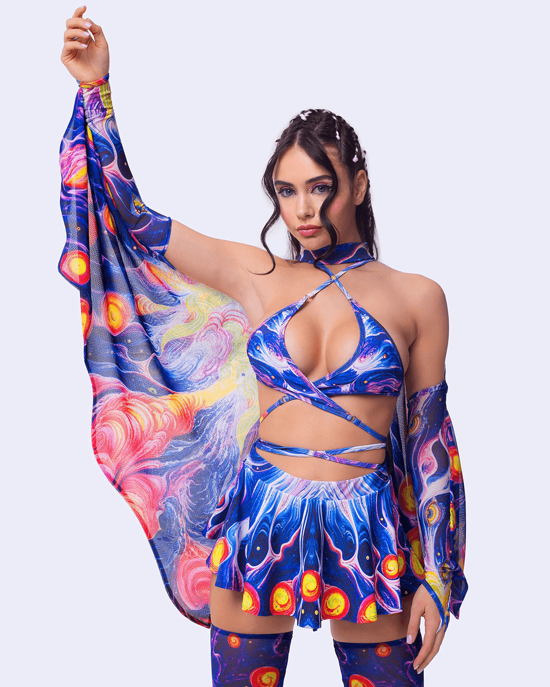 woman in a matching blue fairy set with mesh wings