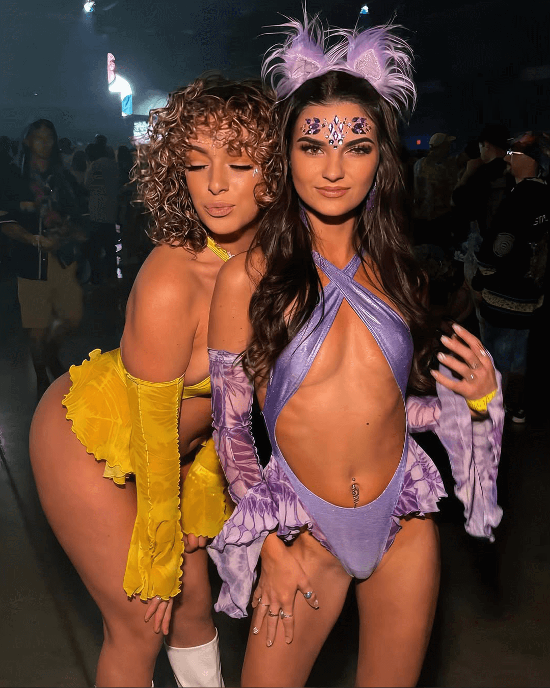 people attending a music festival wearing fairy clothing