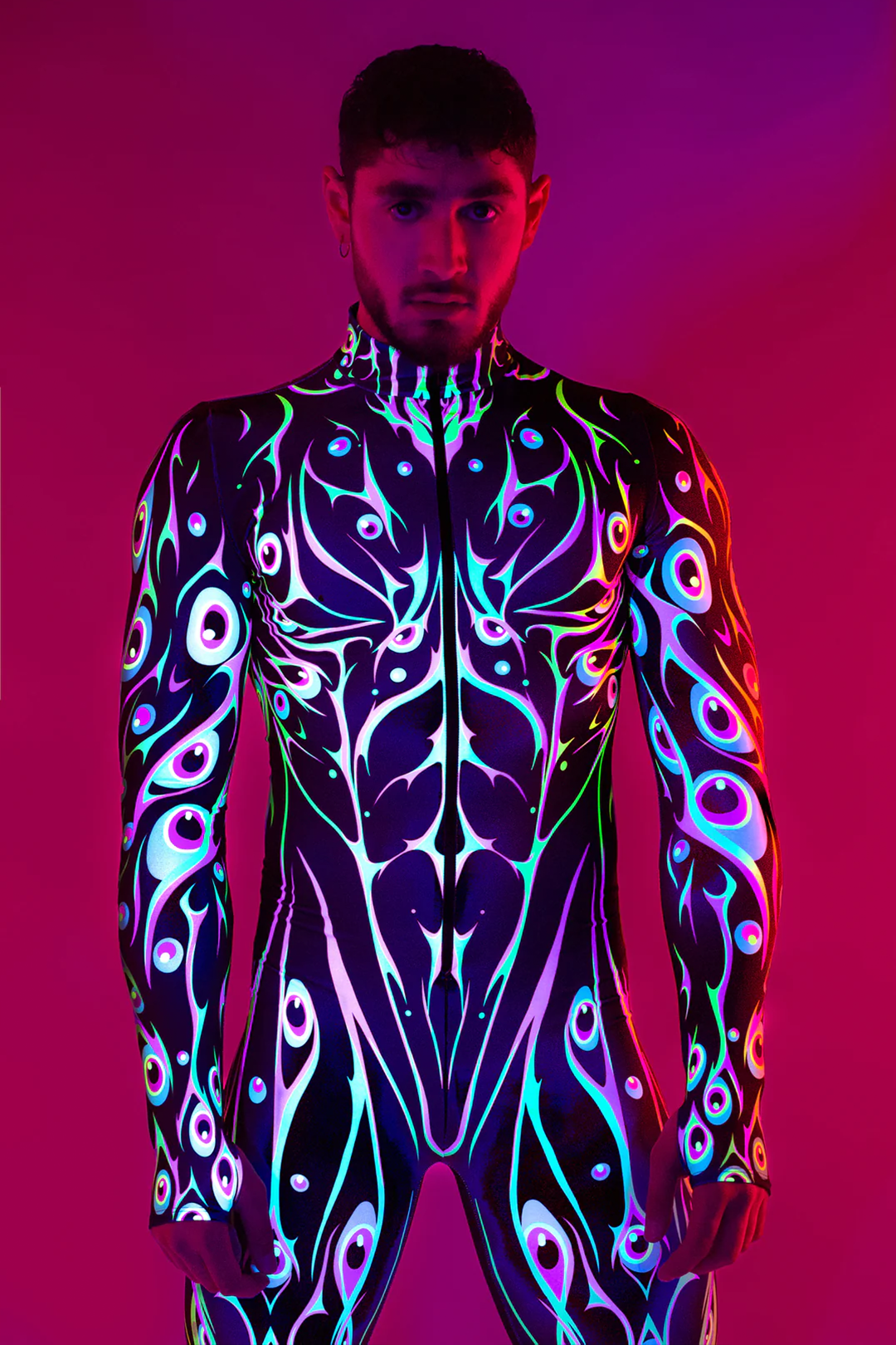 man wearing uv reflective costume with eyes