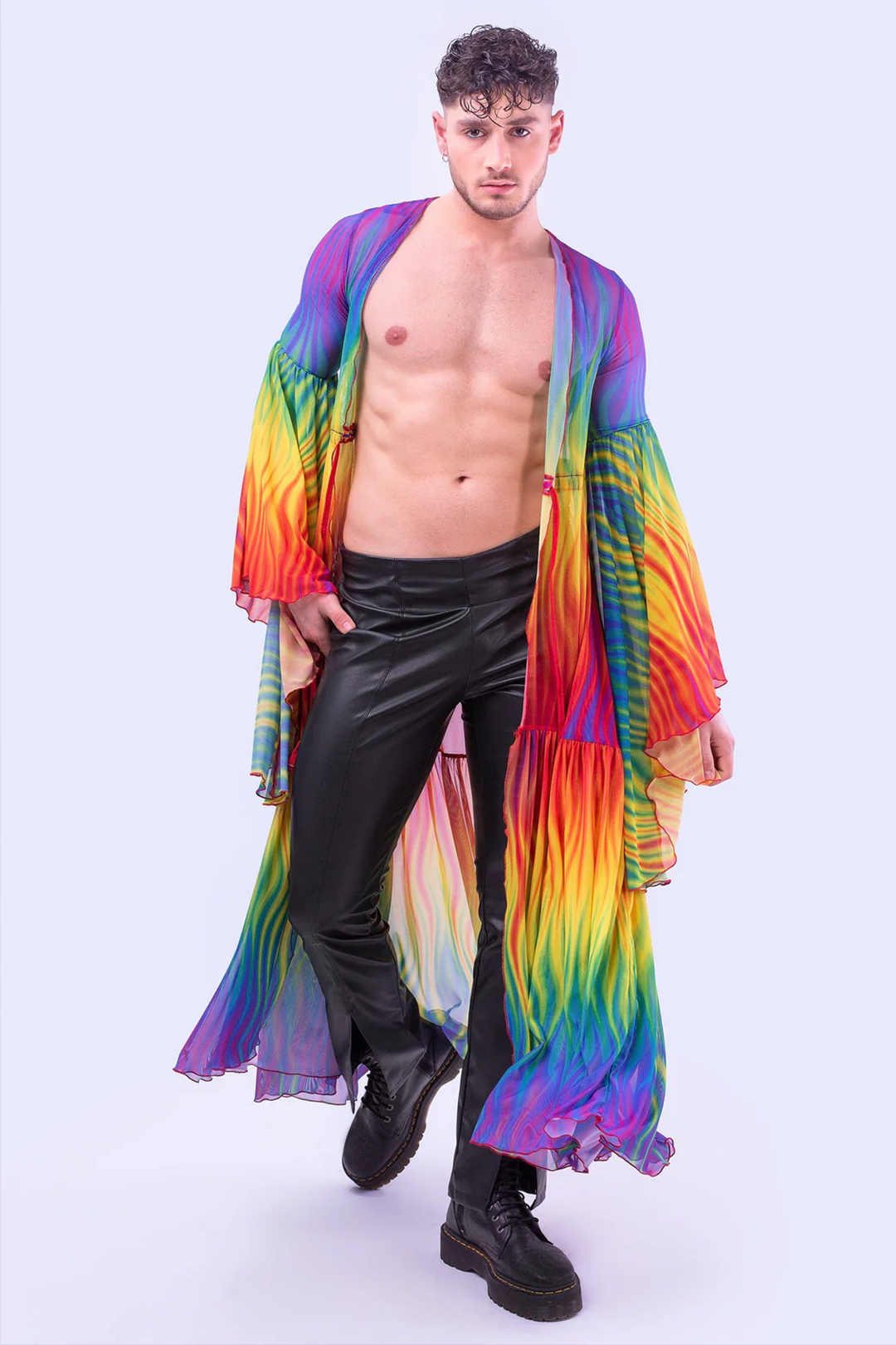 Man wearing unisex pride mesh uv reflective neon duster and leather pants